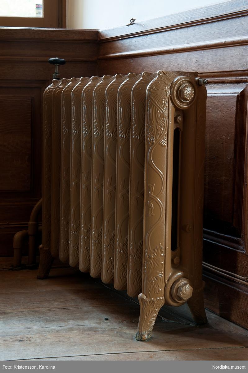 installed freestanding cast-iron radiator photograph