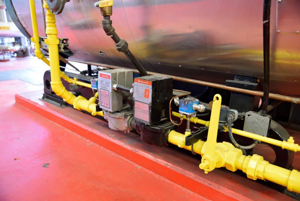 industrial boiler mounted on housekeeping pad photograph