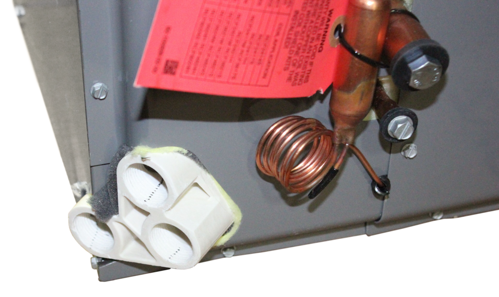 Condensate drain for a cooling fan coil